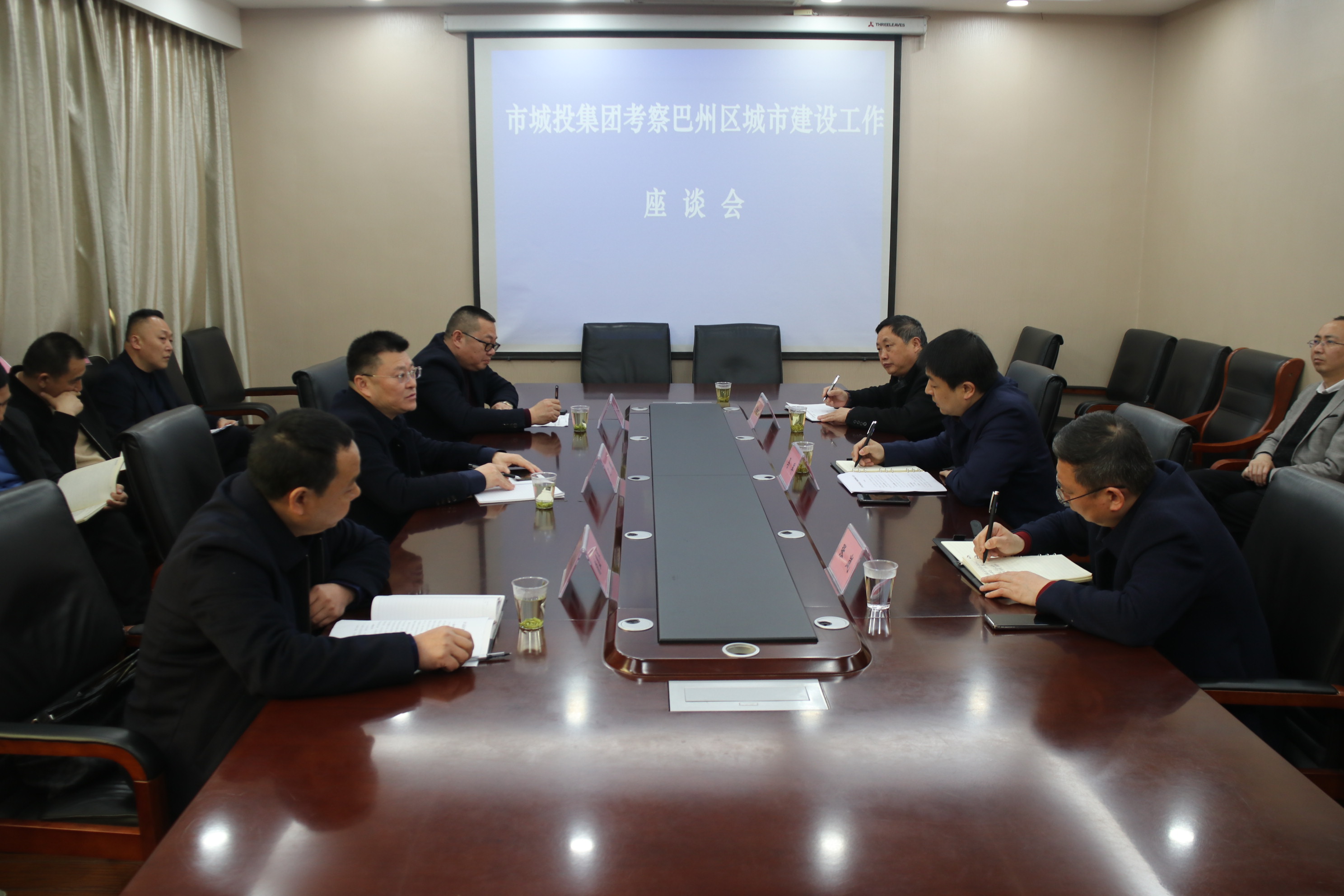 市城投集团党委书记董事长沈鹏率队前往巴州区对接工作