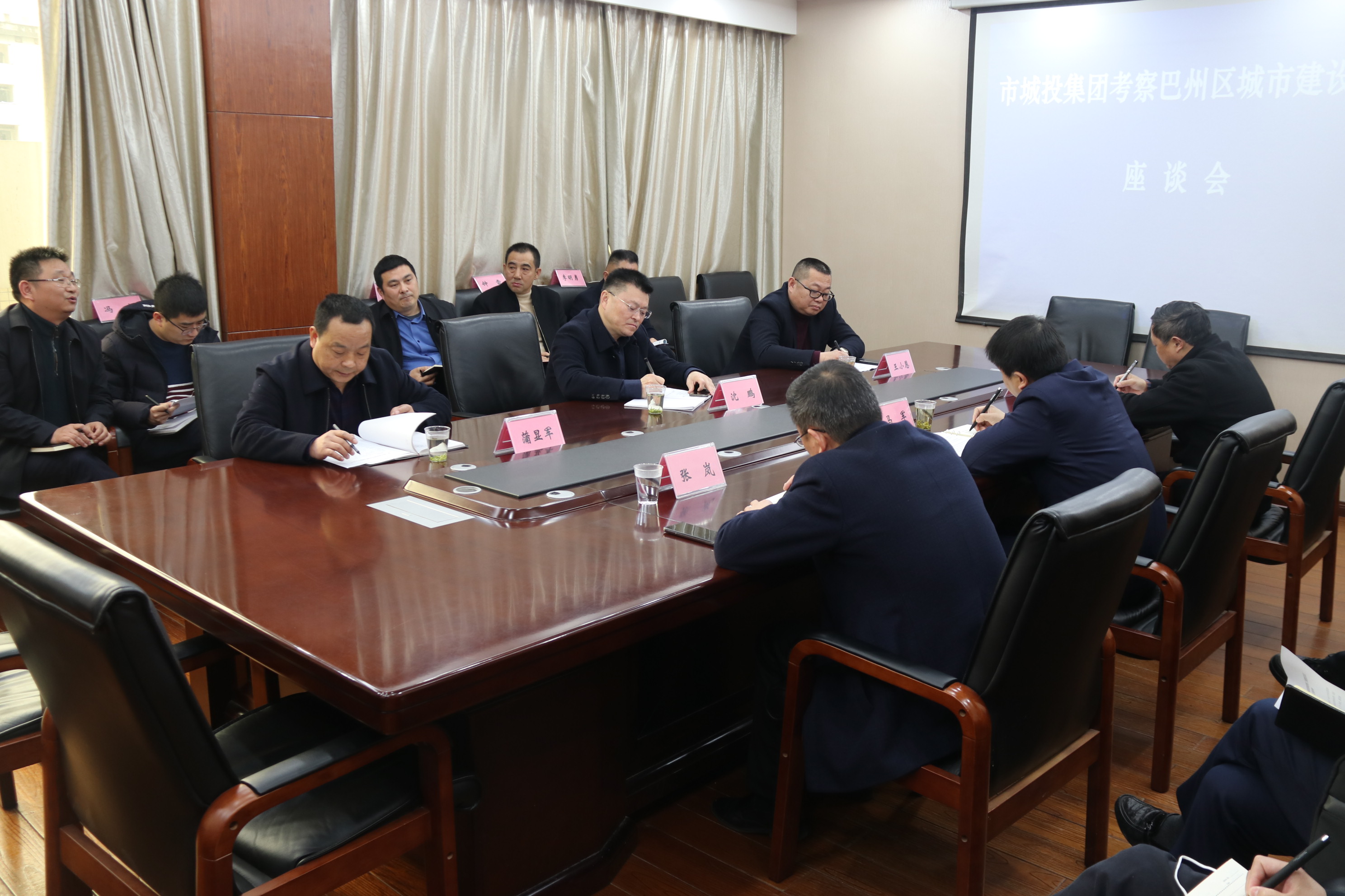 市城投集团党委书记董事长沈鹏率队前往巴州区对接工作